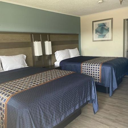 Executive Inn & Suites Бомонт Екстериор снимка